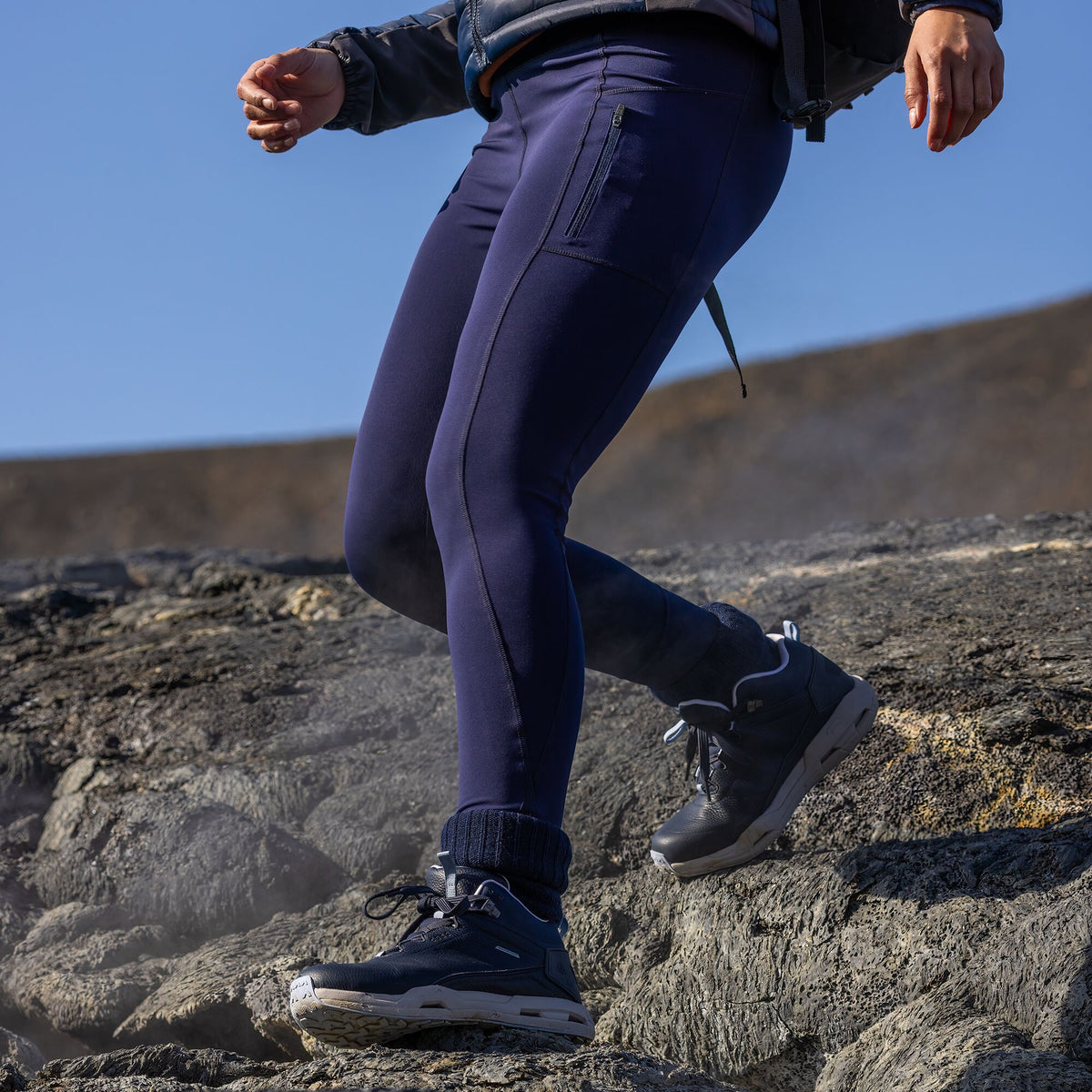 Woman hiking wearing Craghoppers Women's Kiwi Pro UPF50 Thermo Thermal Leggings Tights Blue Navy 7V1 CWJ1334 CWJ1335