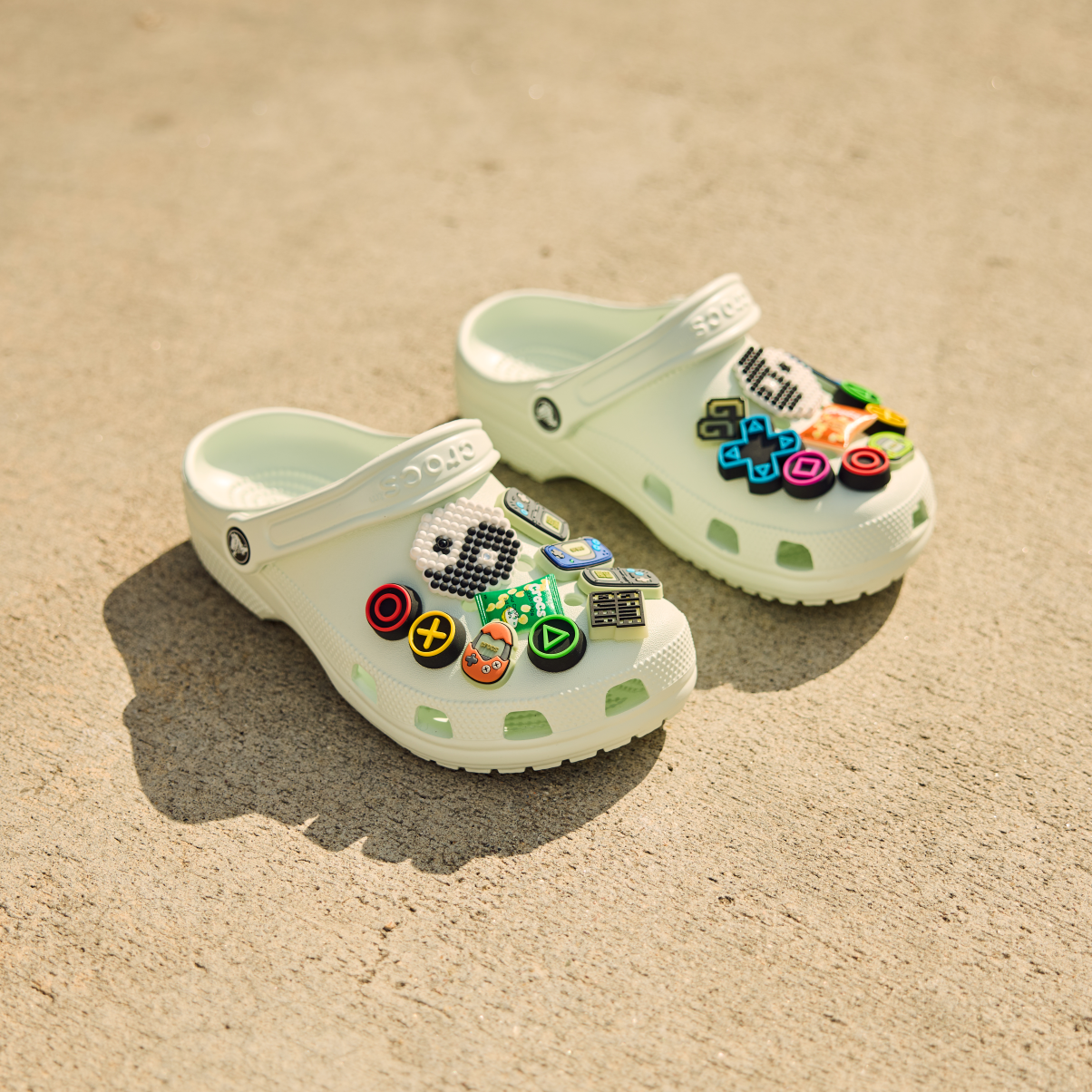 Crocs Unisex Classic Clogs Mint Tint 3YF 10001 sitting on the concrete