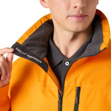 Load image into Gallery viewer, Helly Hansen Men's Crew 2L HT Waterproof Jacket 2.0 (Ignite Orange)