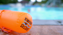Load image into Gallery viewer, Swim Secure Tow Woggle (Orange)
