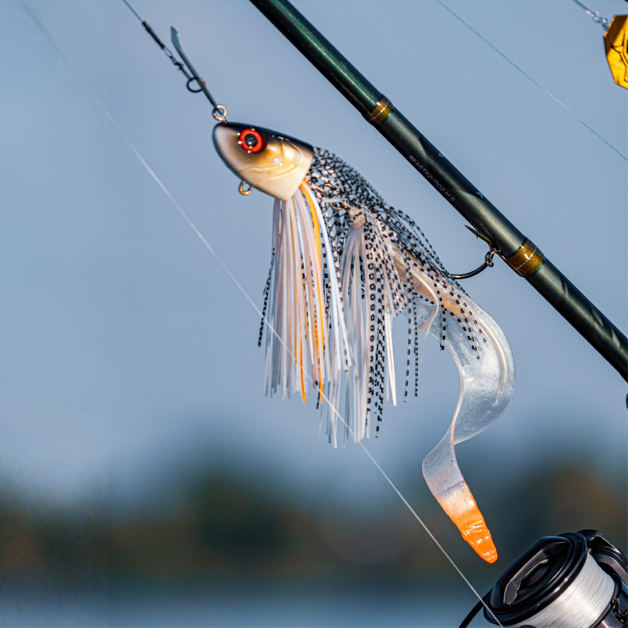 Abu Garcia Beast Bladed Jig 25cm 50g Soft Lure Roach 4 Pack 162119 rigged up on a rod
