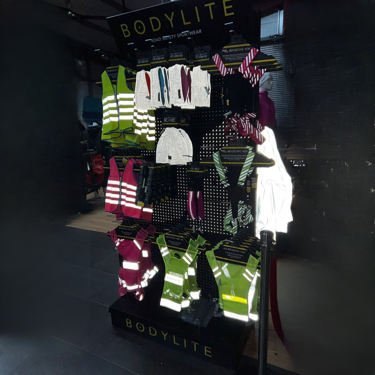 Bodylite Reflective Hi-Vis Gear stand in the dark