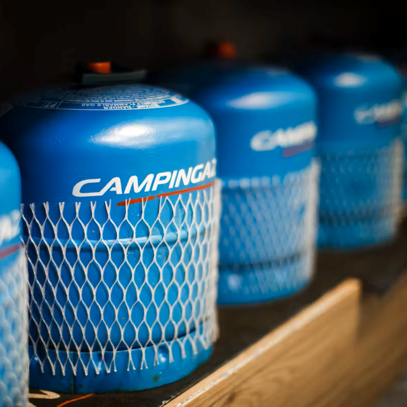 Camping Gaz 907 Cylinder Bottle Gas GAS907CYL bottles lined up on a shelf