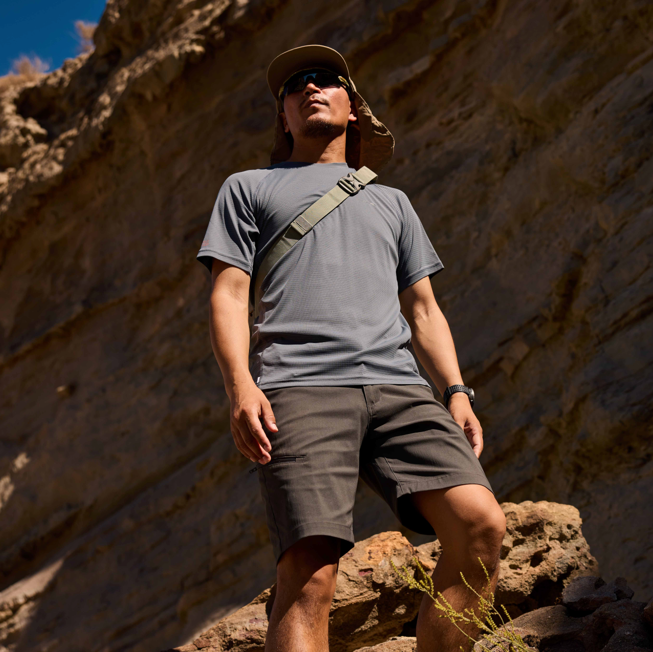 Man wearing Craghoppers Unisex Nosilife Desert III Sun Hat Pebble 695 CMC132 in the desert
