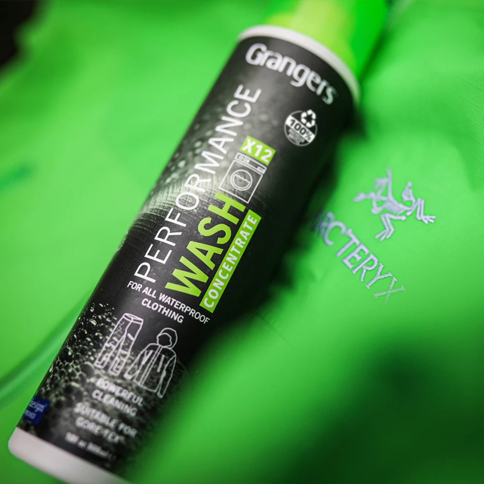 Grangers Performance Wash concentrate bottle on a green jacket
