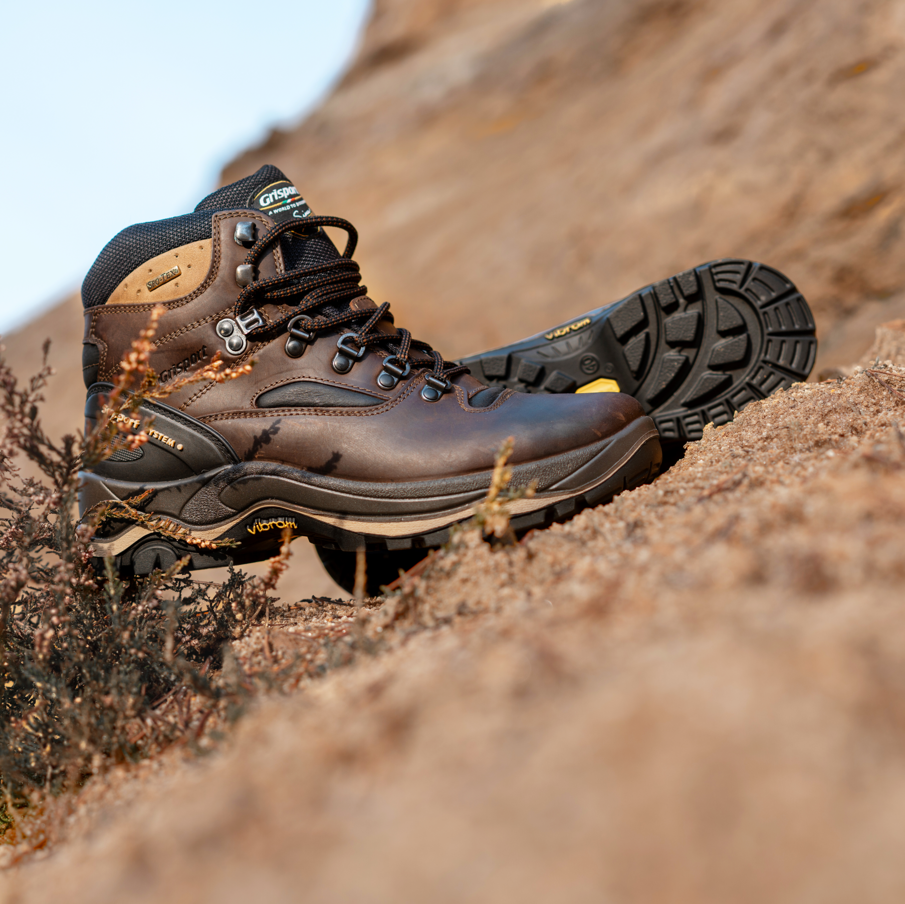 Grisport Men's Quatro Waterproof Hillwalking Boots Brown CMG614 on a gravel incline