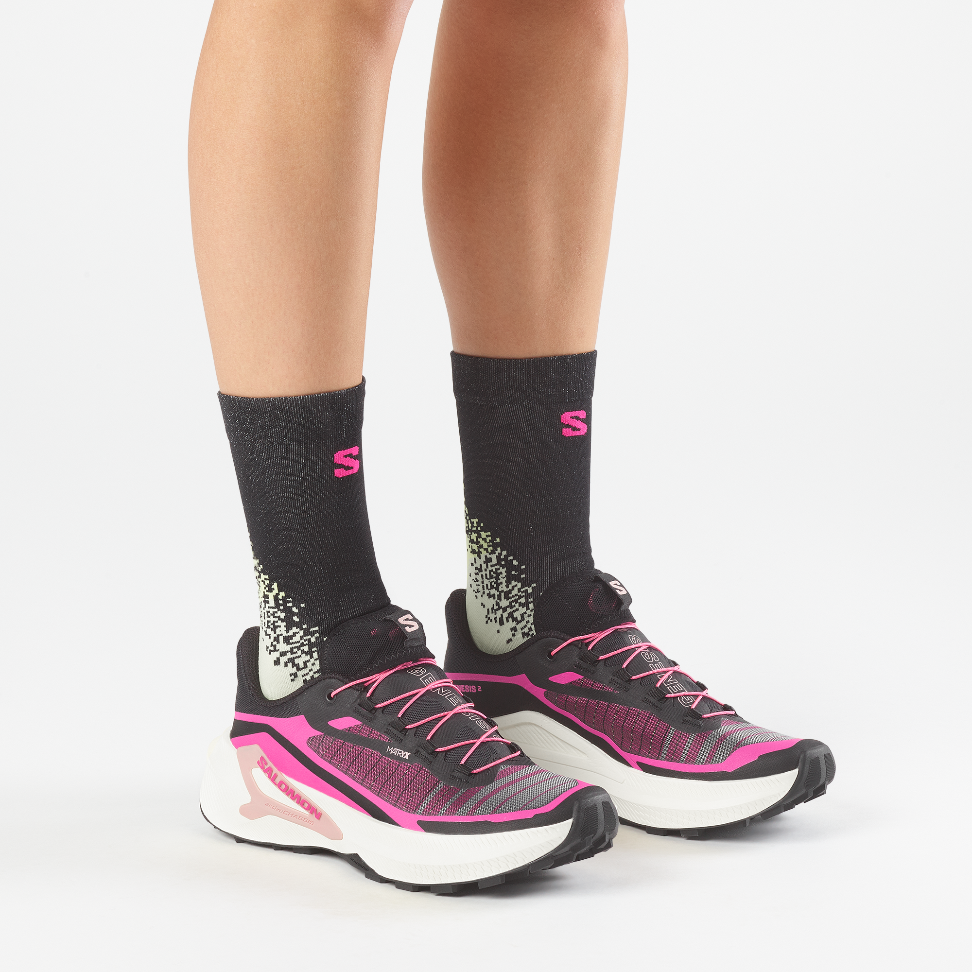 Woman wearing Salomon Women's Genesis 2 Trail Running Shoes Black Vanilla Ice Pink Yarrow L49305300