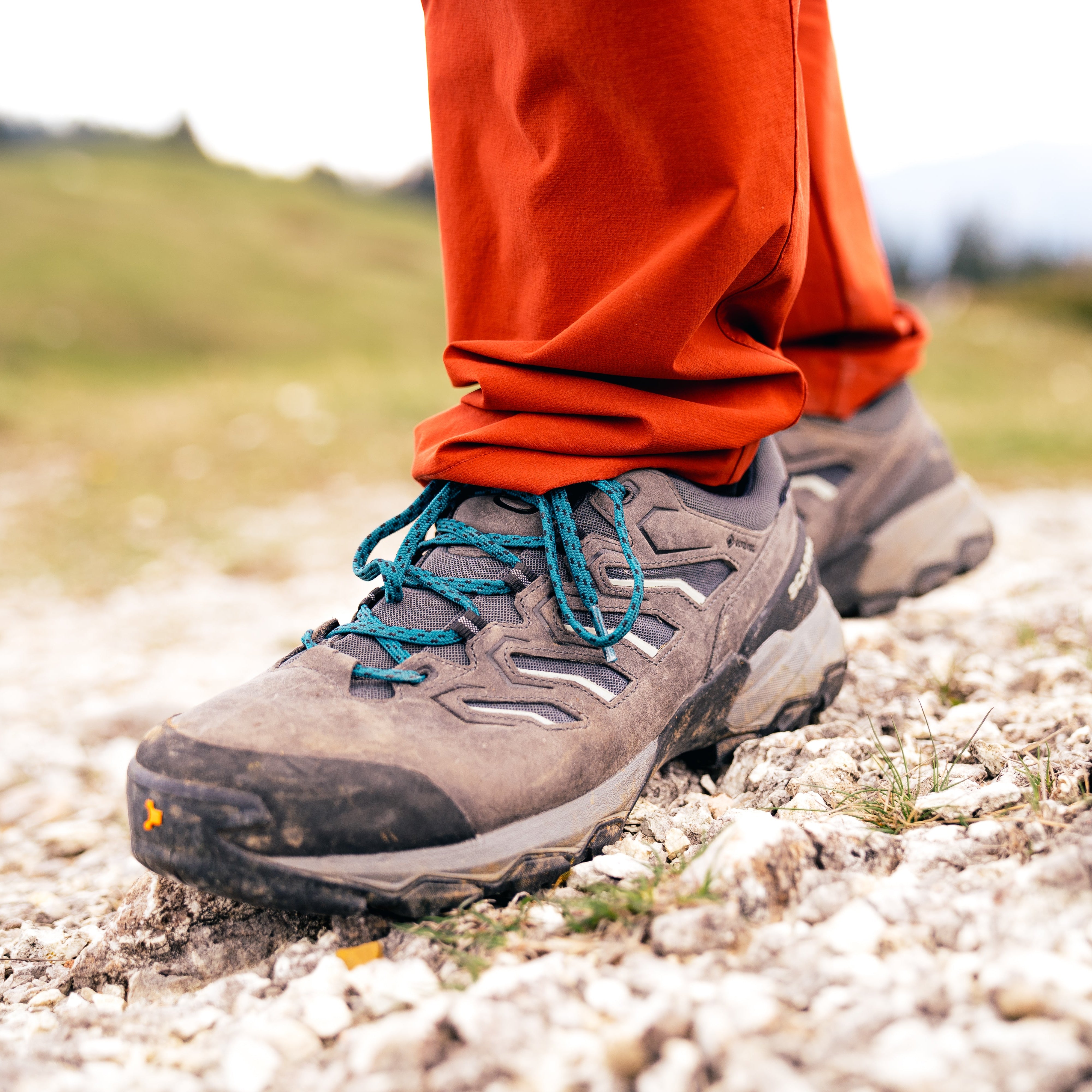 Person wearing Scarpa Men's Moraine Mid Gore-Tex Hillwalking Boots Anthracite 63056-201 standing on a rock outside