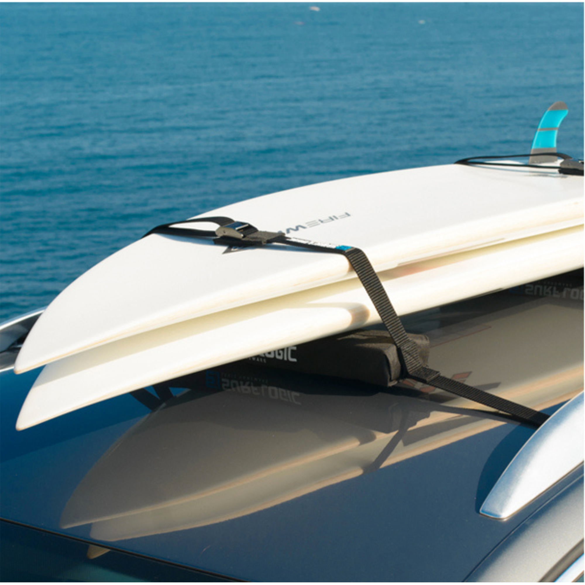 2 Surfboards stacked on top of each other, strapped to roof of car using Surflogic Surfboard Soft Rack Single 50cm 2 Per Pack 59158