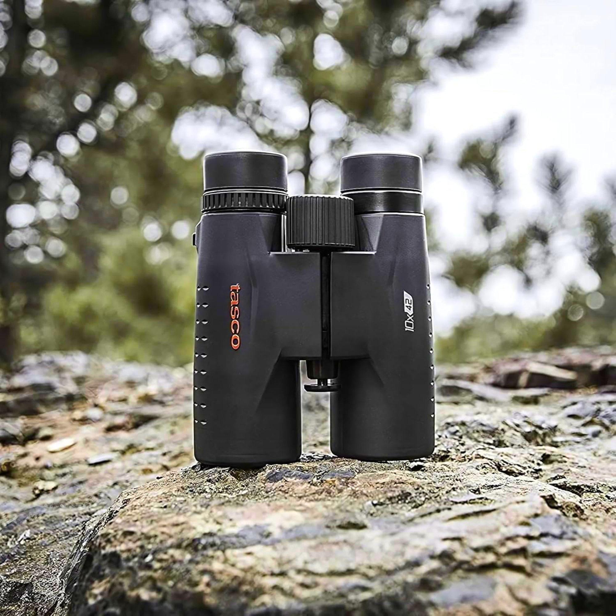Tasco Essentials Binoculars Black 10 x 42 TAES10X42 on rocky ground