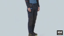 Load and play video in Gallery viewer, Helly Hansen Workwear Men&#39;s Oxford 4X Construction Trousers (Black)
